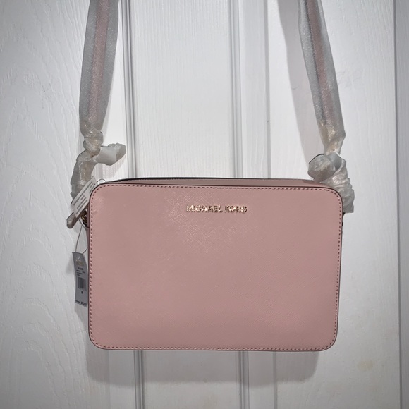 Michael Kors Handbags - NWT large Michael Kors East West camera bag